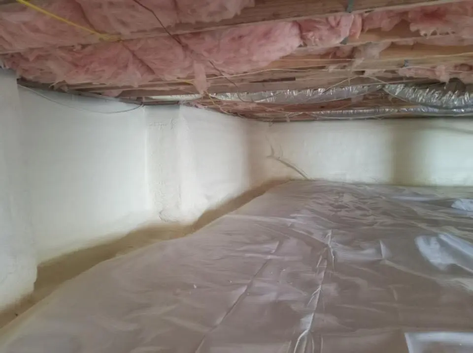Crawl space encapsulation with closed-cell spray foam for Commercial Roof Restoration in Oneida